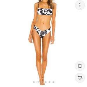 Weworewhat Delilah bottoms and top in black and white cowhide.